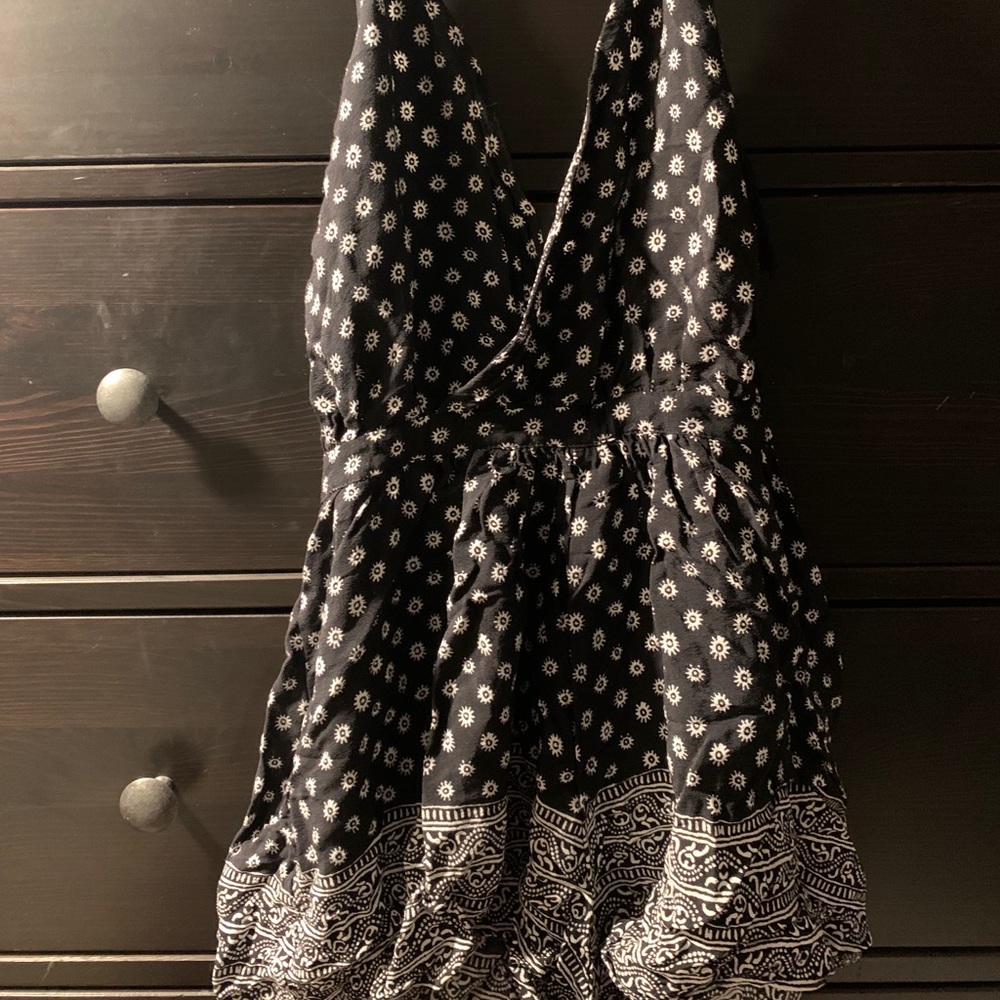 Olivaceous Black and White Halter Floral Patterned Romper - Picture 2 of 9